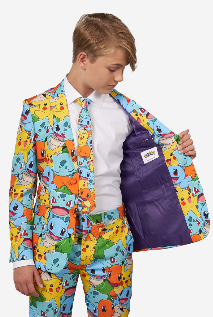 Teen wearing formal multi color suits with Pokemon print