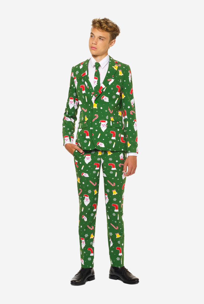 Teen wearing green Christmas suit