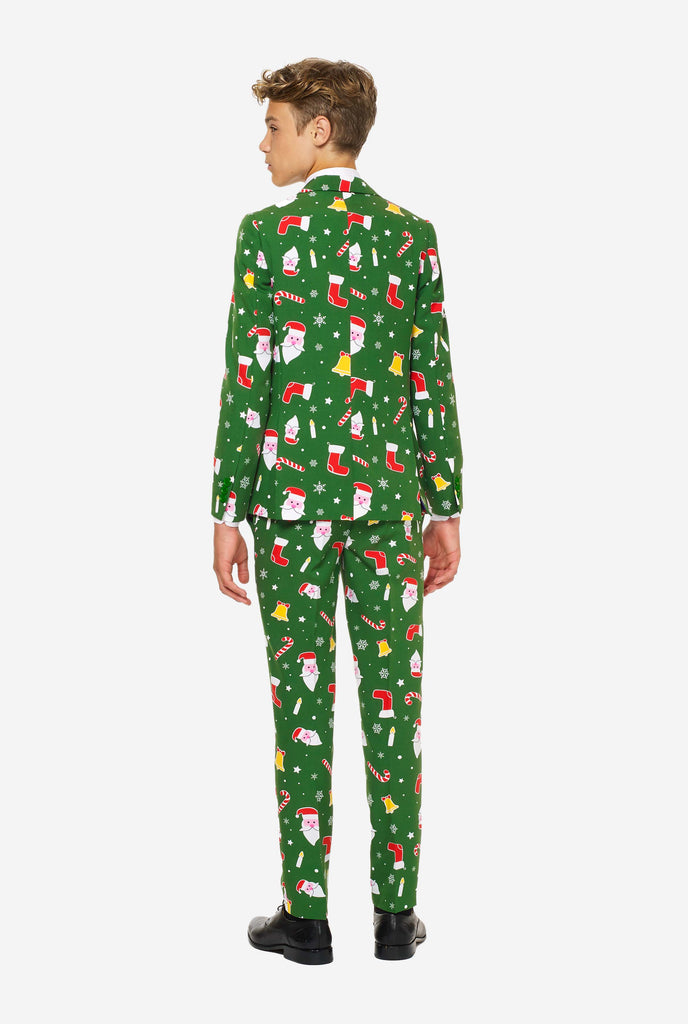 Teen wearing green Christmas suit