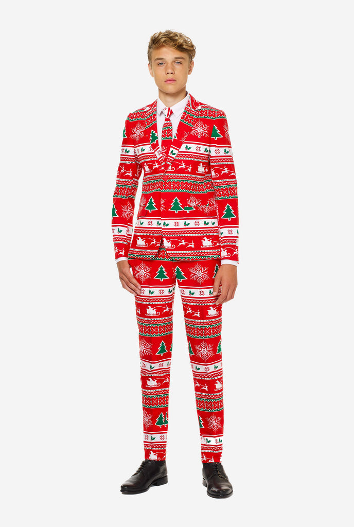 Teen wearing red Christmas suit