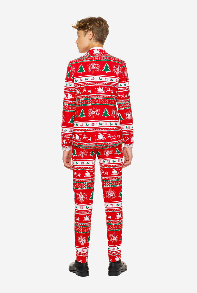 Teen wearing red Christmas suit