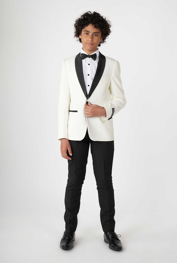 Teen wearing white and black tuxedo