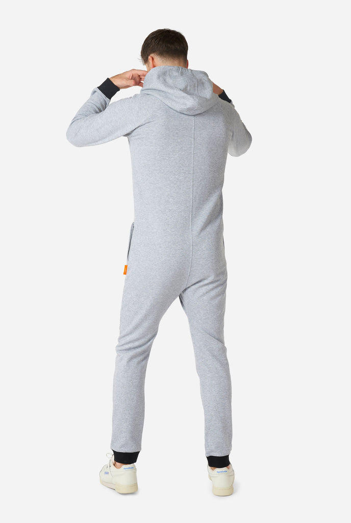 Man wearing grey onesie, view from the back