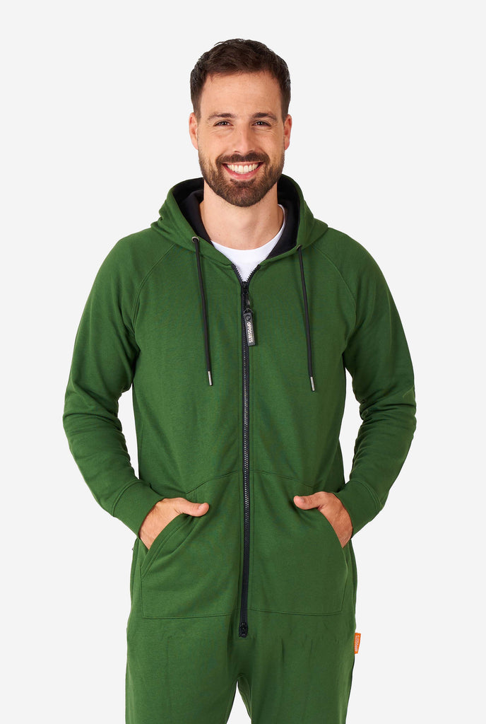 man wearing green onesie