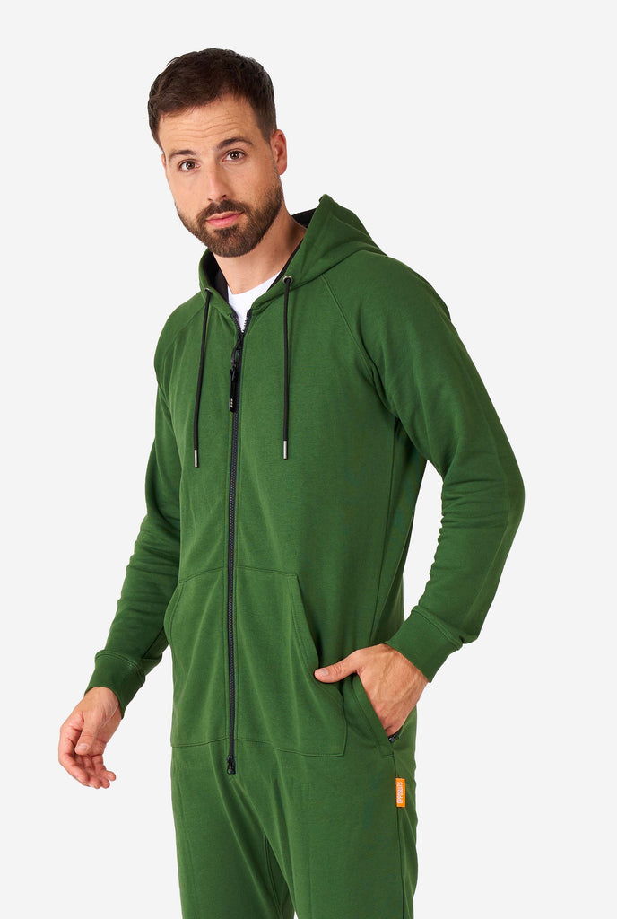 man wearing green onesie