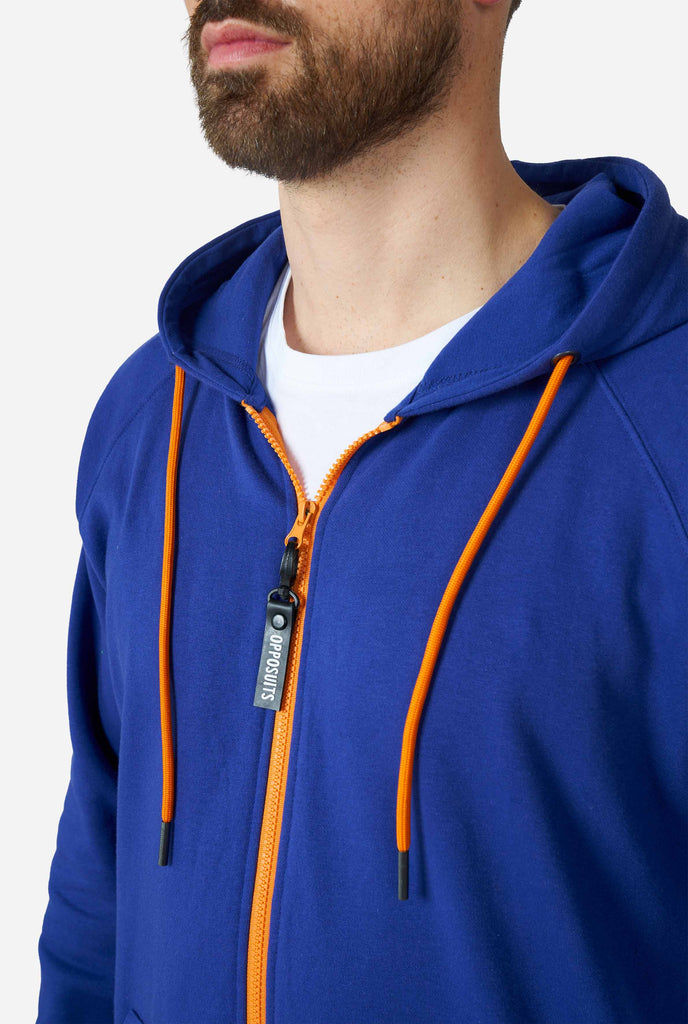 Man wearing Navy blue onesie, chest close up