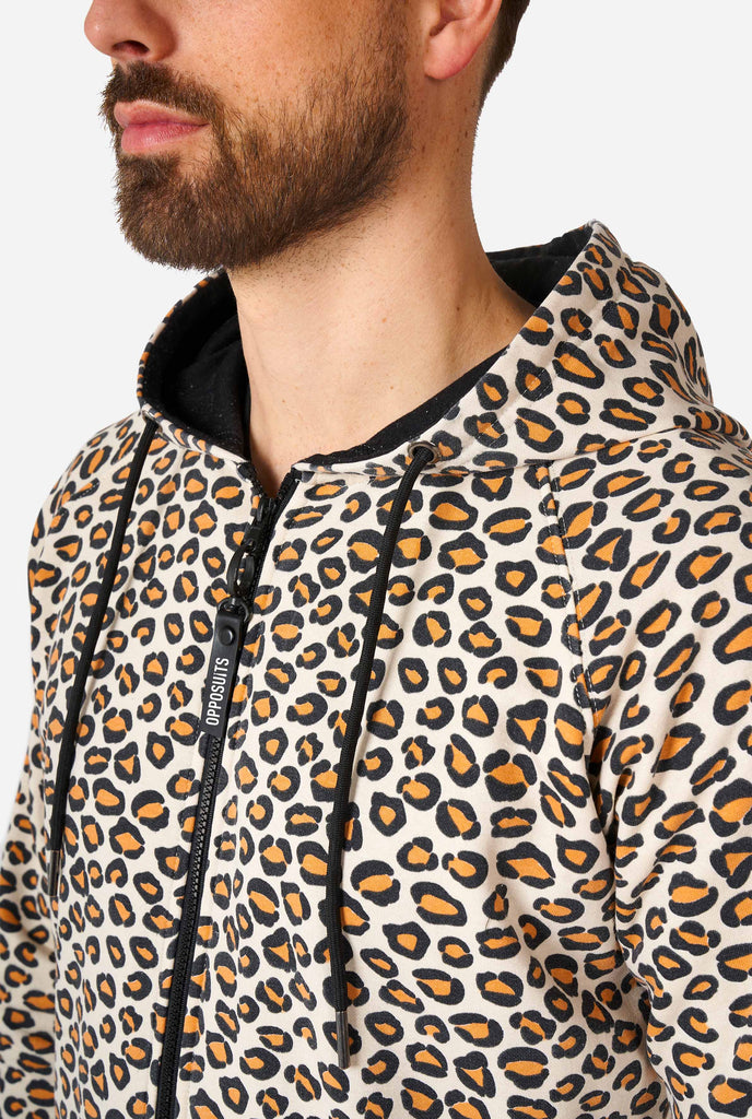 Man wearing jaguar/ panther print onesie, chest close up