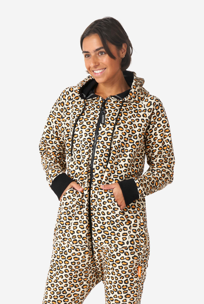 Woman wearing jaguar/ panther print onesie