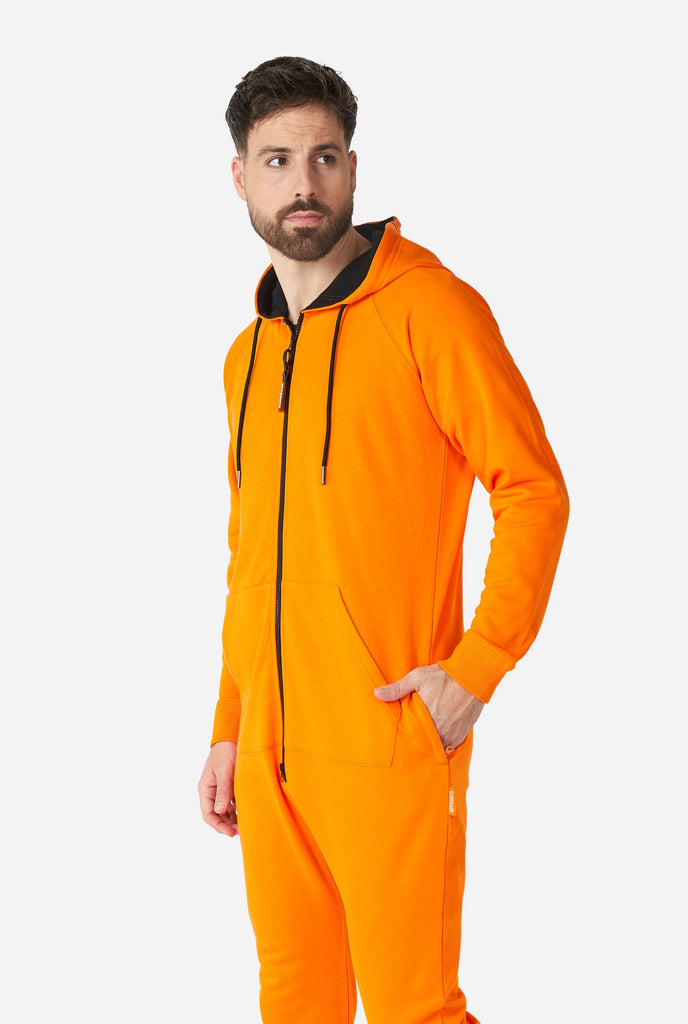 Man wearing orange onesie