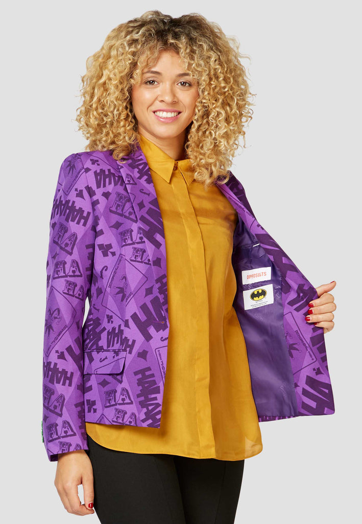 Woman wearing blazer with The Joker print