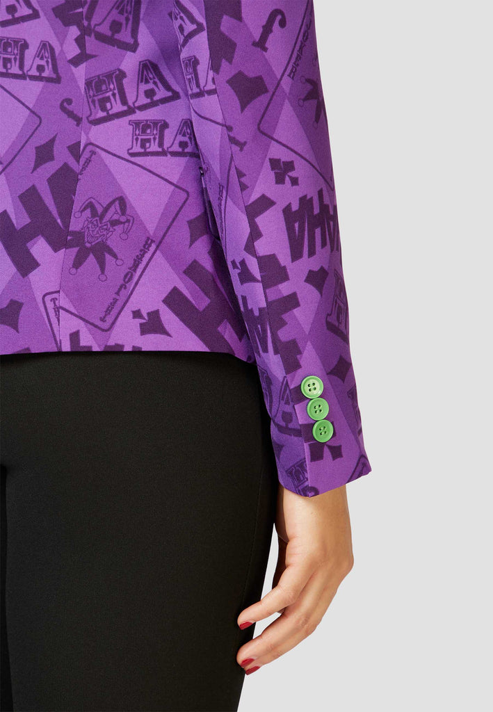 Woman wearing blazer with The Joker print, close up