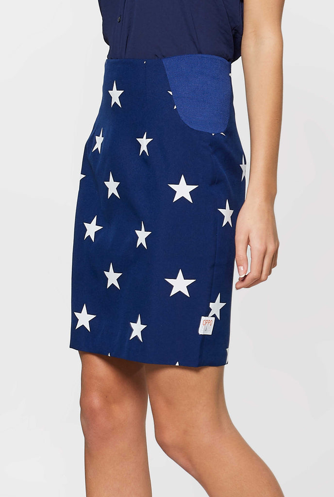 Women's patriotic American Flag suit worn by woman zoomed in at skirt