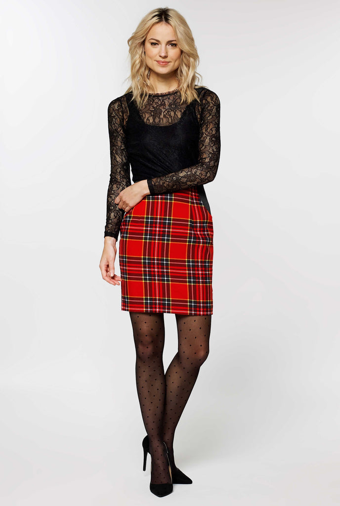 Woman wearing red tartan Christmas suit