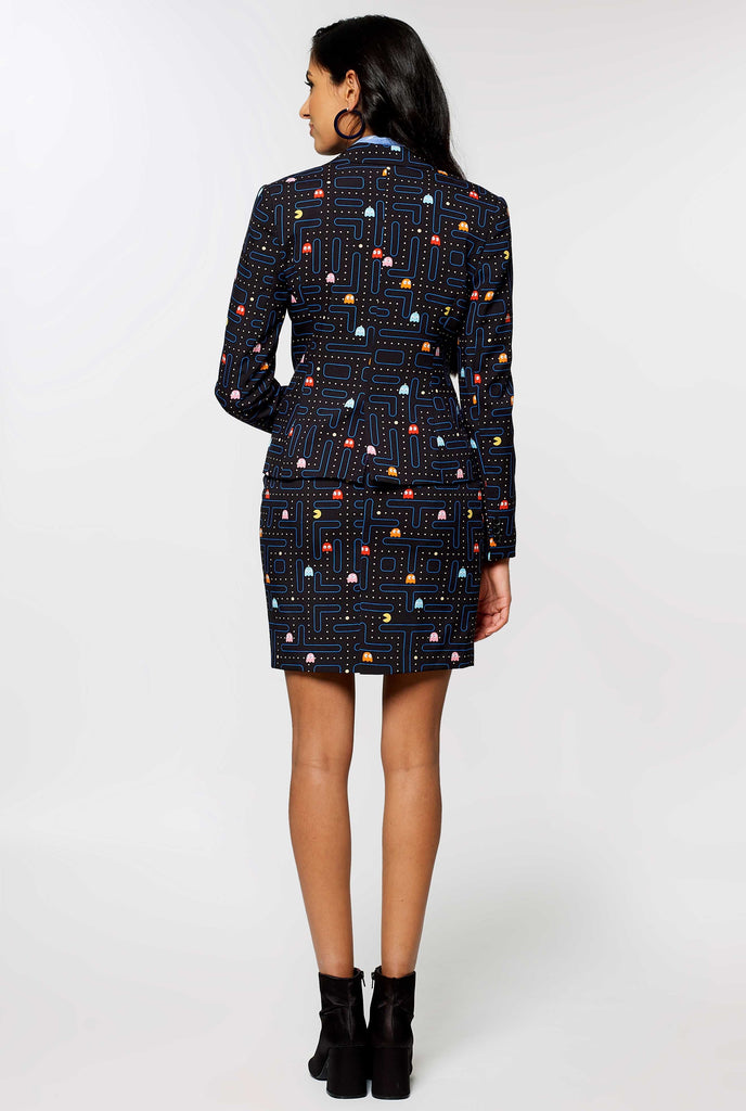 Woman wearing black dress suit with Pac-Man print, view from the back