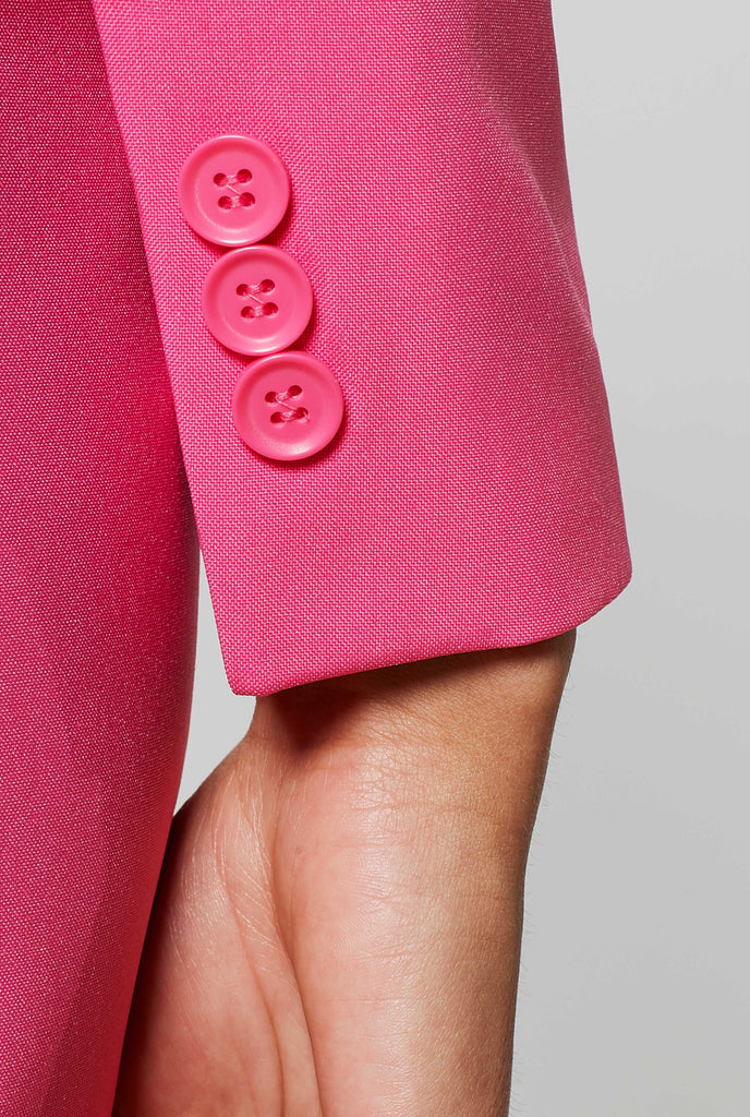 Woman wearing pink dress suit, sleeve close up