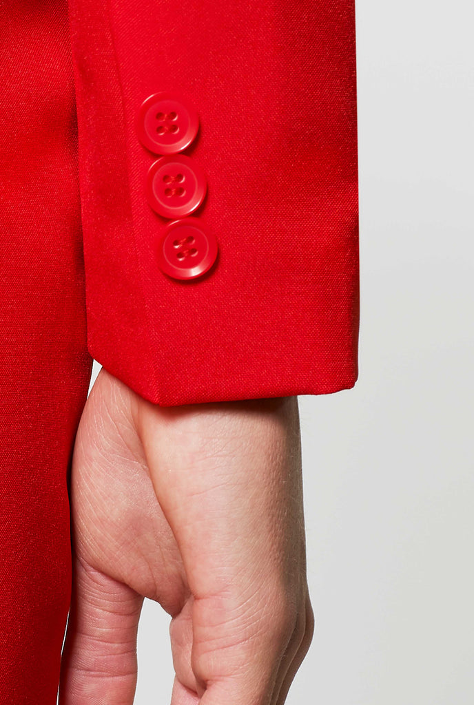 Woman wearing red dress suit, sleeve close up