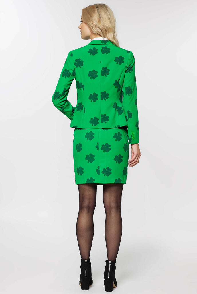 Woman wearing St Patrick's Day themed suit, view from the back