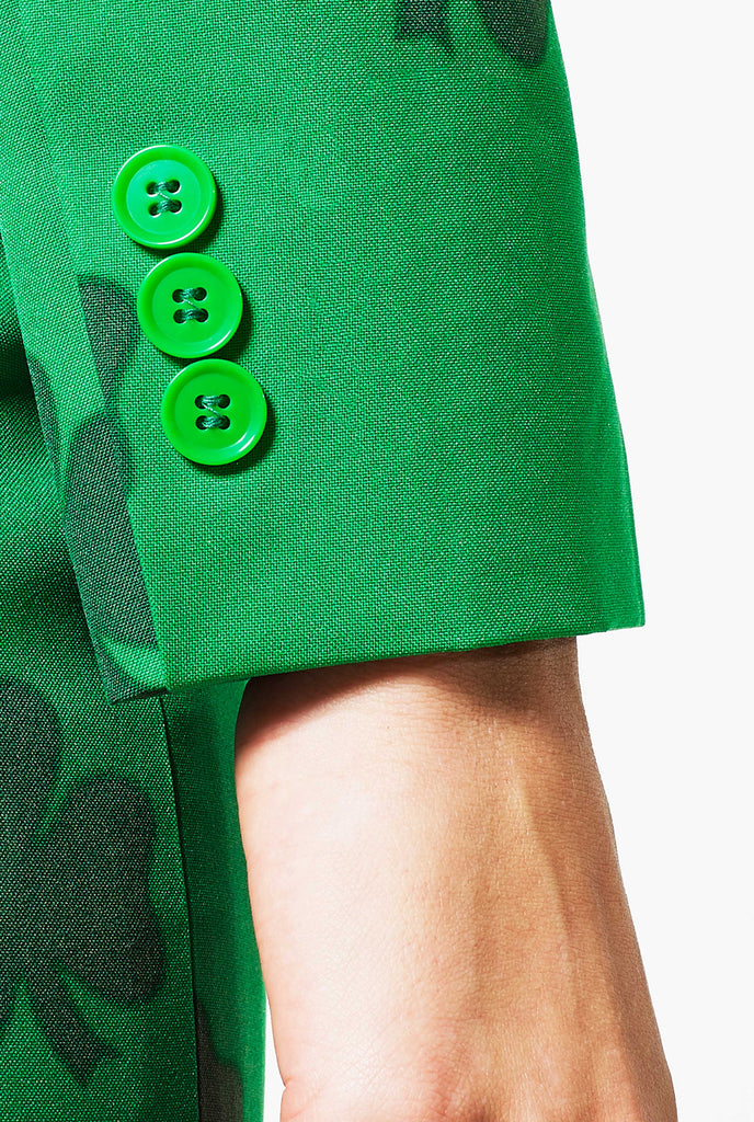 Woman wearing St Patrick's Day themed suit, sleeve close up