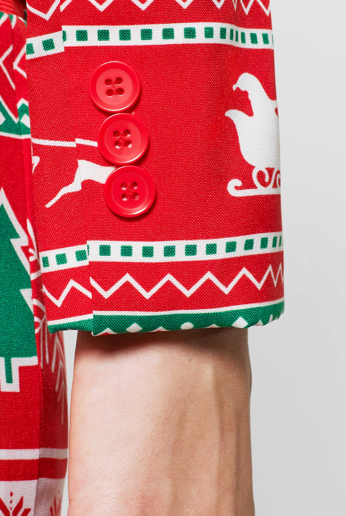 Woman wearing red Christmas suit with Christmas icons, sleeve close up