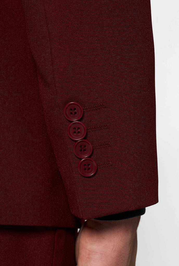 Bordeaux red solid color suit Blazing Burgundy worn by men detailed sleeve with buttons